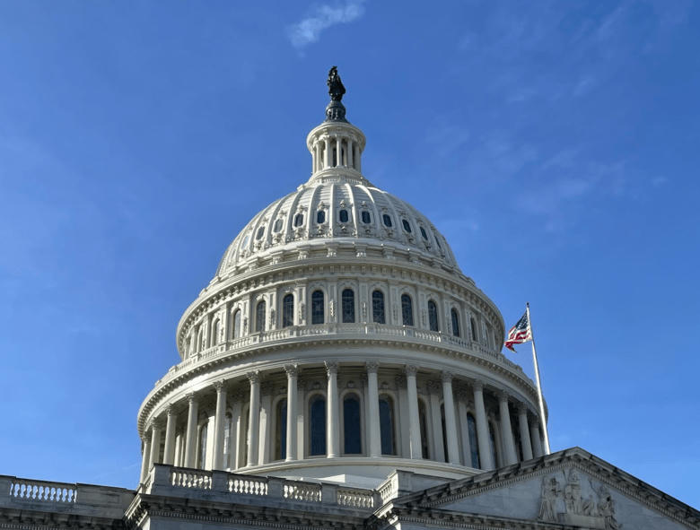 U.S. Capitol dome against a blue sky